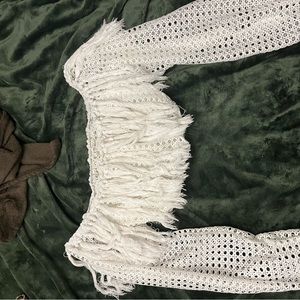 Unknown brand. White long sleeved crop top with interesting detail.